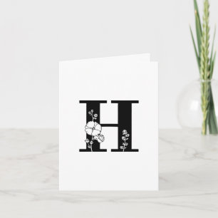 Monograma H floral en tarjeta blanca