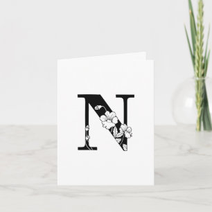 Monograma N floral en tarjeta blanca