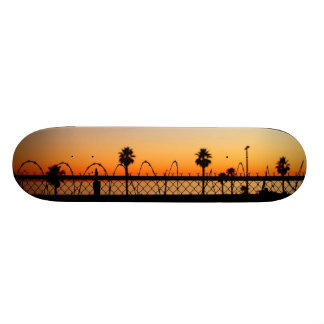 Monopatín de la puesta del sol de la playa del LA