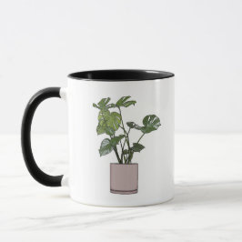 Monstera en una taza de té rosado