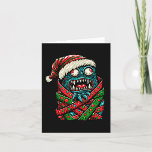 Monstruo de Navidad envuelto en regalo