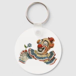 Muecas del payaso en la flor - llavero