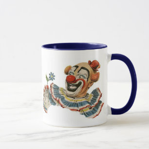 Muecas del payaso en la flor - taza