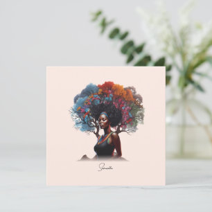 Mujer afroamericana con pelo adornado con árbol