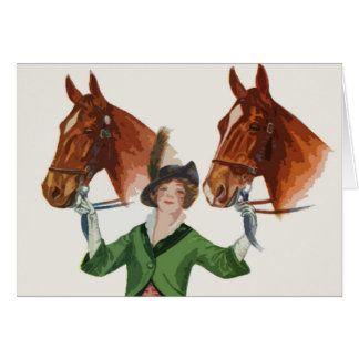 Mujer elegante con los caballos