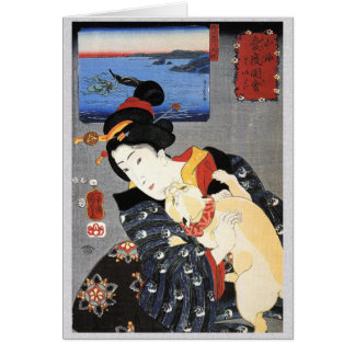 Mujer japonesa sosteniendo gato