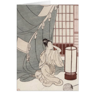 Mujer joven que se arrodilla por su red de