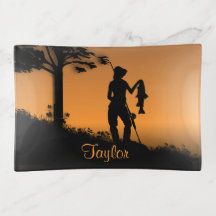 Mujer pescadora al atardecer