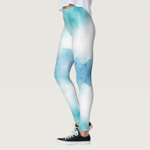 Mujer que lleva leggings con un efecto de acuarela