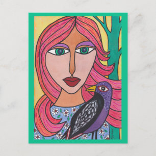 Mujer roja haitiana con postal de pájaro