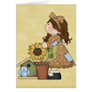 Muñeca adorable del país con el girasol