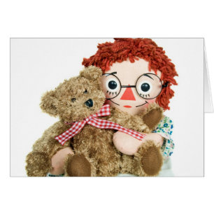 muñeca de rag vieja y oso de peluche