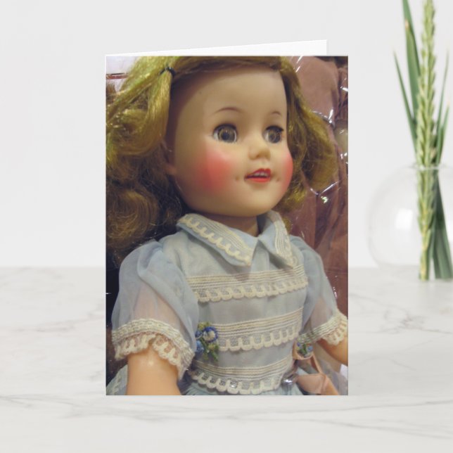 Muñeca del vintage en tarjeta de felicitación azul (Anverso)