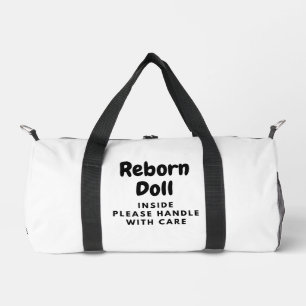 Muñeca Reborn dentro de una Bolsa Tote