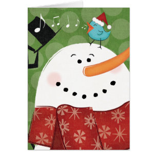 Muñeco de nieve del navidad con el pájaro