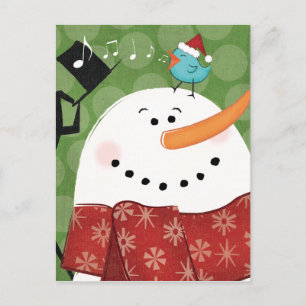Muñeco de nieve del navidad con el pájaro