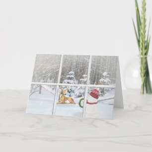 Muñeco de nieve del navidad con los ciervos en
