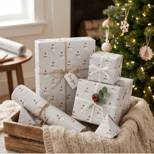 Muñeco de nieve dibujado a mano en papel de regalo