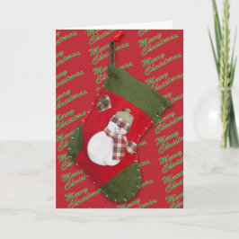 Muñeco de nieve en calcetín de Navidad sobre rojo