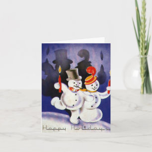 Muñecos de nieve bailando con velas de Navidad vin