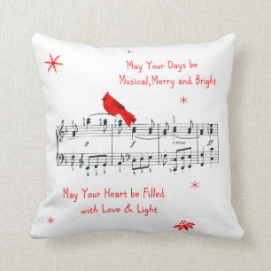 Música y almohada cardinal roja del navidad del