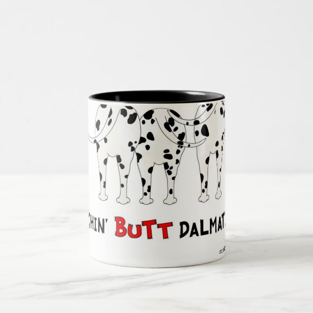 Nada empalma la taza de los Dalmatians (Centro)