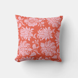 Naranja colorido y almohada adamascada rosa