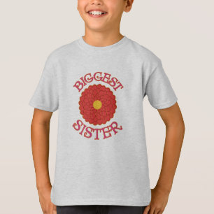 Naranja de la hermana grande y camiseta de la flor