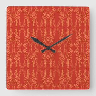 Naranja de moda sobre el reloj de pared cuadrado d