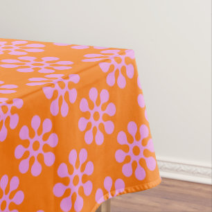Naranja retro y mantel rosado del modelo de flores