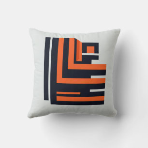 Naranja y almohada de diseño geométrico negro