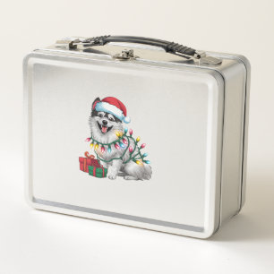 Navidad de perro de espitz japonés iluminando Sant