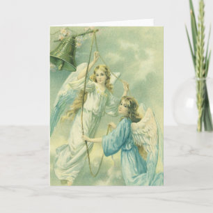 Navidad vintage, ángeles victorianos con una Campa