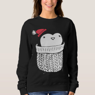 Navidades cortan pingüino bebé en suéter de cuello