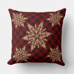 Navidades de almohada dorada con copos de nieve