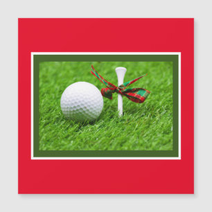 Navidades de bola de golf con tac sobre césped ver