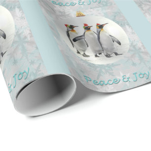 Navidades de pingüinos pacíficos envuelven papel