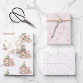 Navidades escuetos envolviendo hojas de papel