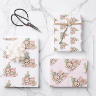 Navidades escuetos envolviendo hojas de papel