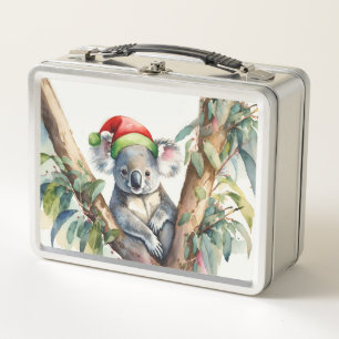 Navidades Koala santa hat en un árbol de goma