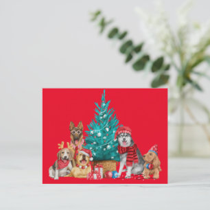 Navidades manada de perros bajo la postal del árbo