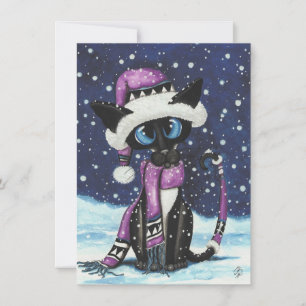 Navidades nevan el invierno de un gato siamés