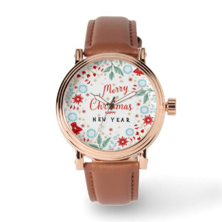 Navidades y reloj de pulsera de Año Nuevo feliz