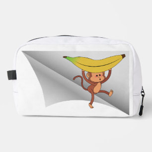 Neceser mono con banana bajo el parche