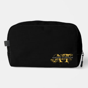 Neceser Monogramado en oro y negro con problemas modernos