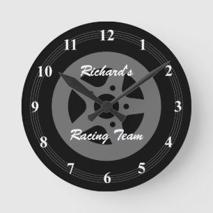 Neumático de rueda de coche y reloj de pared de ll