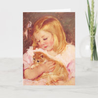 Niña con la tarjeta de felicitación del gato