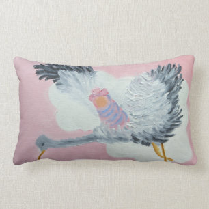 Niña del vuelo y almohada de la cigüeña