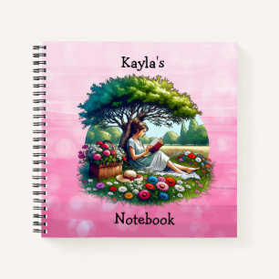 Niña leyendo un libro bajo un árbol en un día rela