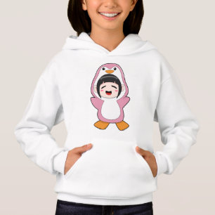 Niño con traje de pingüino